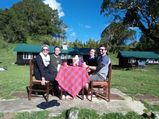 Travelers relaxing at Mount Kenya Chogoria Bandas accommodation